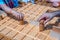 children play a traditional Turkish wooden puzzle game.