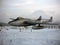 Children playground/amusement park in the snowy alps in Switzerland with a real airplane in the park