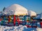 Children playground. Colored wooden structures under large snow caps