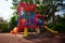 Children playground with metal slide. Kid`s colorful area.Modern children playground in park