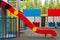 Children playground with slide. Kid`s colorful area.Modern children playground in park