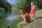 Children playing active game on Tirino river bank in Italian Abruzzo