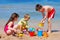 children playing at the beach