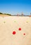 Children playing boules on a beach