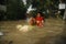 CHILDREN PLAYING AT FLOOD