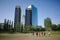 Children playing football in public park. Skyscrapers of Puerto Madero district
