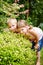 Children playing hide and seek in garden