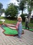 Children playing mini golf