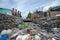 Children Playing Near The Aqueduct Full Of Garbage And Waste By The Ozama River