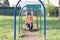 Children playing outdoors. Boy on playground,children activity. Active healthy childhood