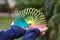 Children playing with rainbow colored wire spiral