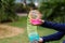 Children playing with rainbow colored wire spiral