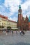 Children playing with soap bubbles in front of the old town hall at the market square in Wroclaw