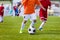 Children playing soccer football match. Running players and kick