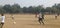 Children playing soccer in a local tournament at a stadium in India