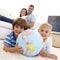 Children playing with a terrestrial globe