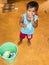 Children playing with toys balloon on the floor of the children`s room. Kindergarten educational games in India