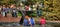 Children playing under whale tail fountain