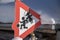 Children playing waring sign on snow