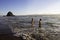 Children Playing in the Water at Cannon Beach