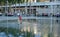 Children playing between water jets.