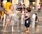 Children playing in water pool