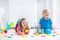 Children playing with wooden toys