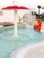 Children pool with umbrella mushroom running water