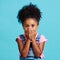 Children, portrait and wow with a girl on a blue background in studio looking surprised or in shock. Face, hands and