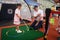 Children practice golf