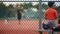 Children practicing baseball at park