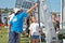 Children preparing racing dinghies at championships. April 18