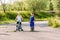 Children preschoolers ride bicycles in the summer in the Park