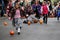 Children Pumpkin bowling down Caroline Street,Saratoga Springs,New York,October,2013