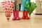 Children in rainboots colourful wear pretty cool and umbrellas