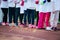 Children in ready position to run on track, closeup