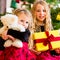 Children receiving presents on Christmas