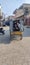 Children in a rickshaw posture after  being discharged from school.