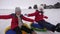 Children ride through snow in winter on an inflatable snow tube. girls relax in winter park for the Christmas holidays