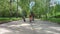 Children riding bicycles on the road.