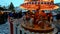 Children riding on the carousel at Christmas time in Tallinn