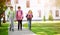 Children with rucksacks standing in the park near school