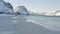 Children running walking and having fun  on a winter polar beach Ramberg