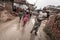 Children in rural village in India with elderly man