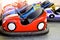 Children`s attractions. Rows of Bump Cars. Colorful electric car for kids. Riding on Dodgem Cars. Close-up.
