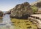 Children`s beach, equipped between large stones on the Black sea.