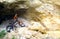 Children`s bicycle on the background of rocks and stones