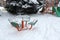 Children`s carousels in the playground under a layer of white snow in winter.