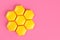Children`s Color puzzle, honeycomb mosaic on a pink background