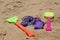 Children\'s colorful sandy toys on beautiful a beach. India Goa